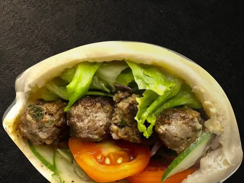 Beef kebab pita sandwich with lettuce, tomato and cucumber - Sababa, Cebu City